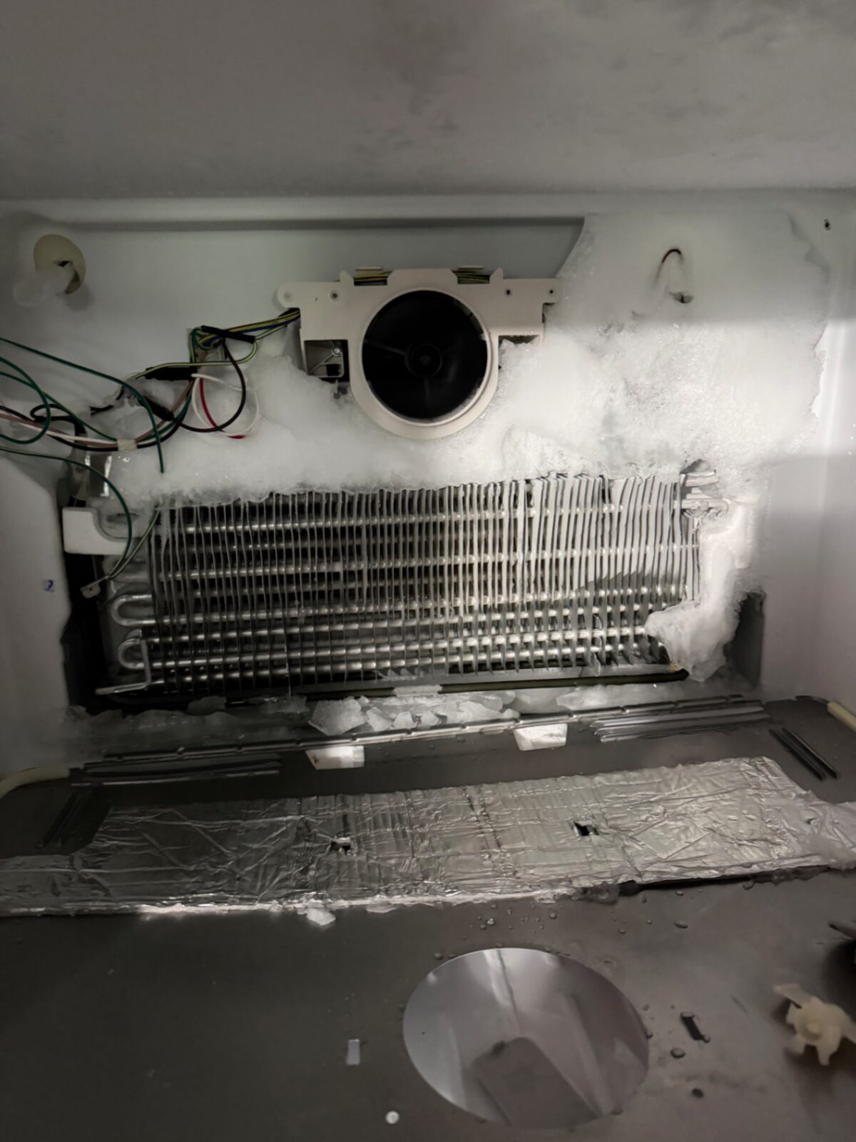 Frost buildup on refrigerator evaporator and defrost system service
