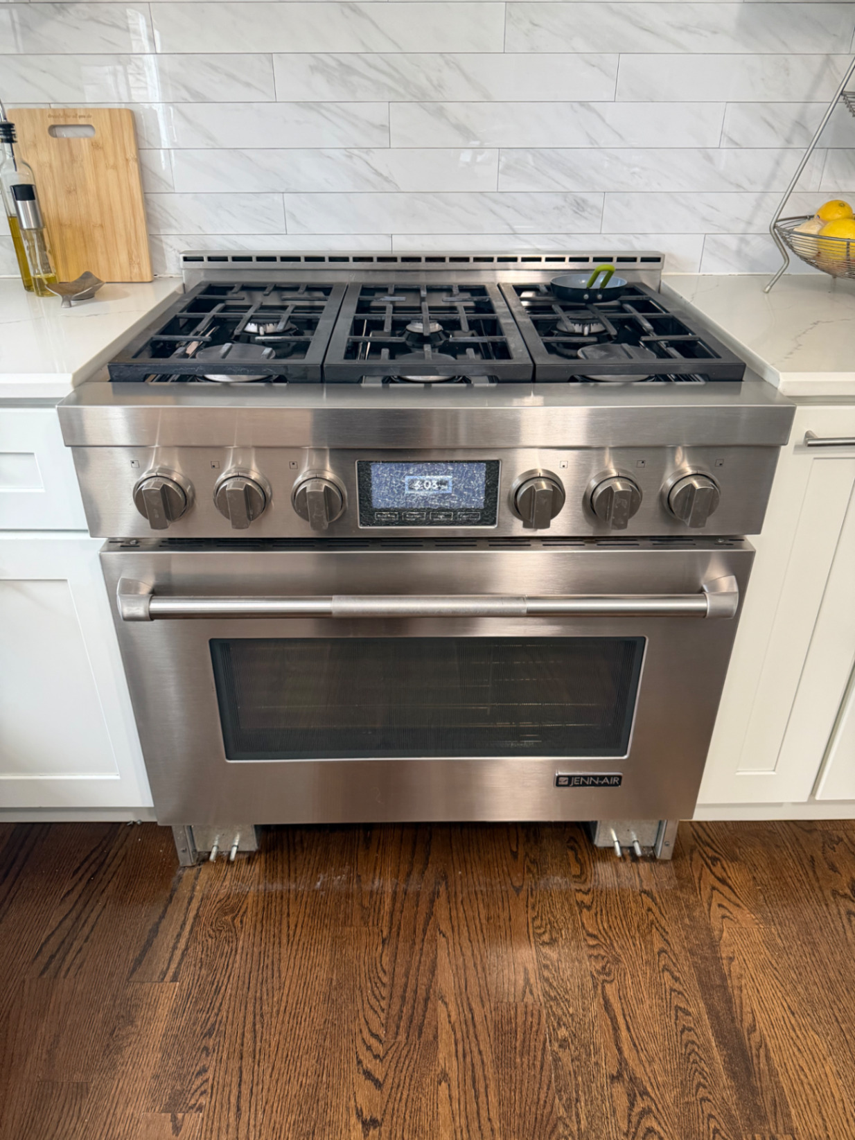 JennAir gas range installed in customer kitchen after service visit